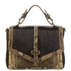 Wonderful condition Tory Burch snake skin cross body purse.